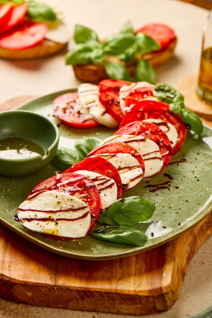 Candy Cane Caprese Salad on a green plate.