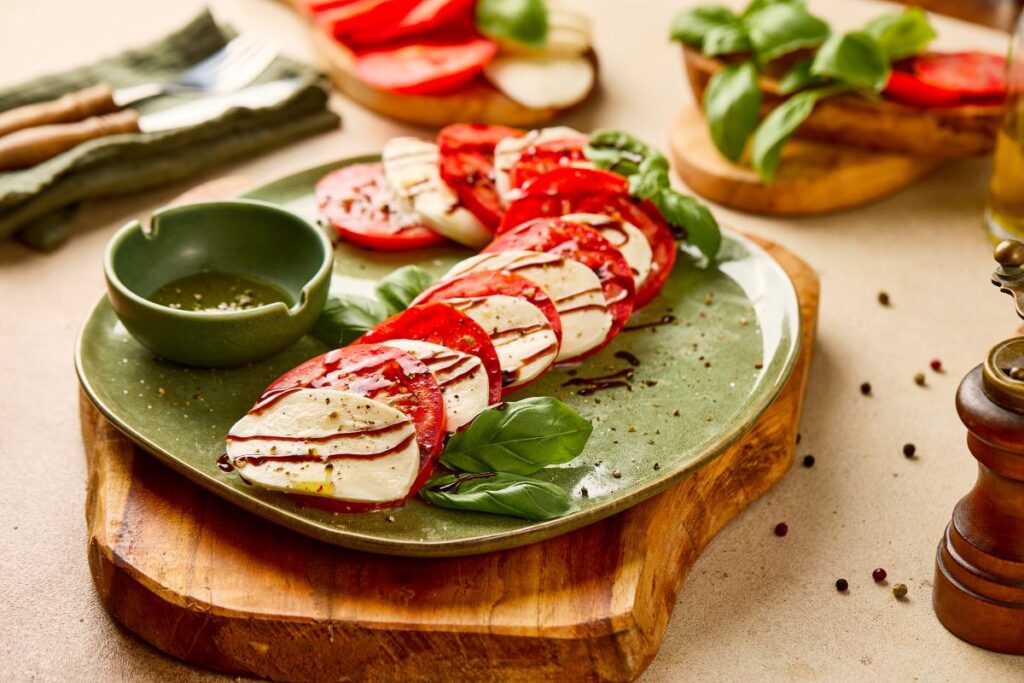 Candy Cane Caprese Salad on a green plate.