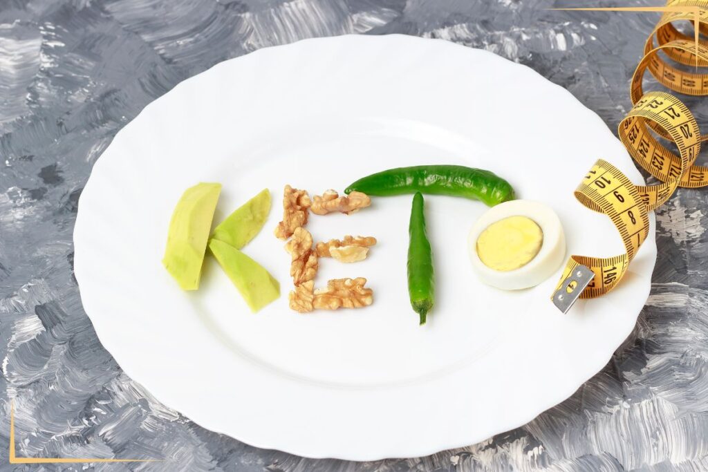 A plate with the word KETO spelled with food.