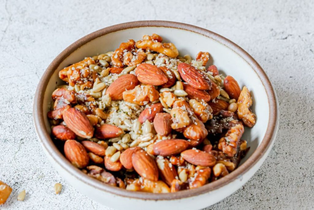Nut & Seed Granola in a white bowl.