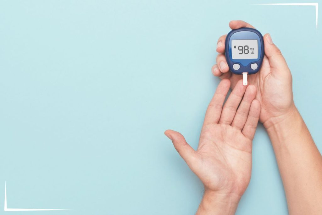 A person checking their blood sugar.