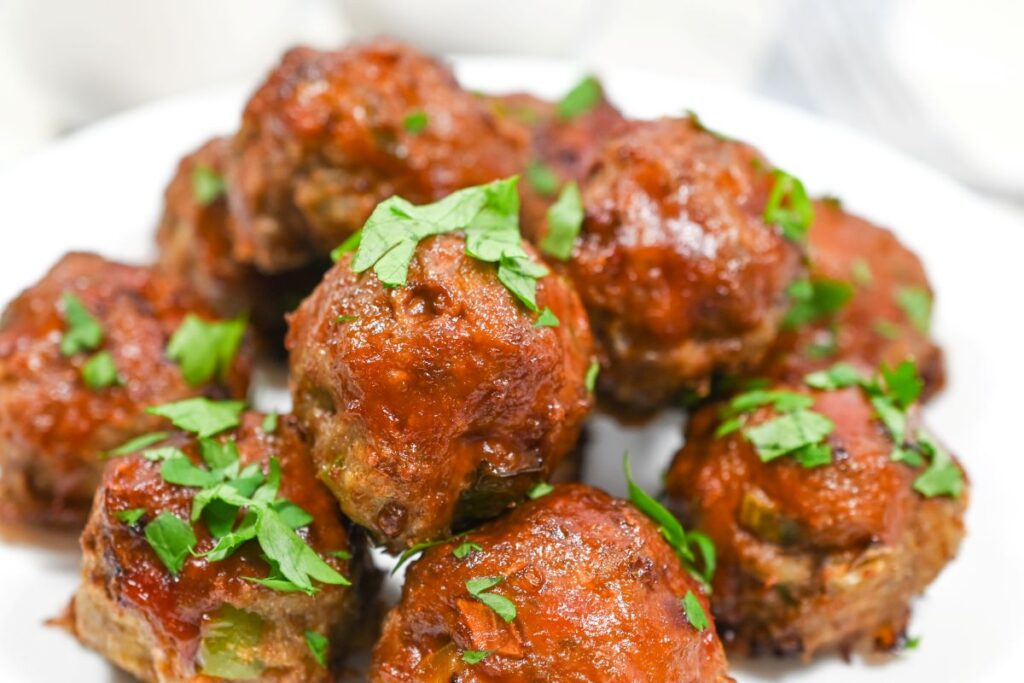 Turkey Meatloaf Meatballs on a white plate.