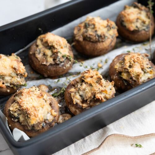 Stuffed Mushrooms in a pan.