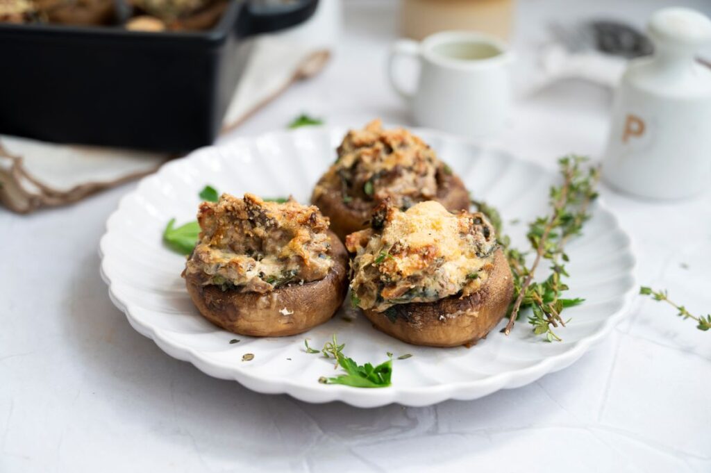 Stuffed Mushrooms on a white plate.