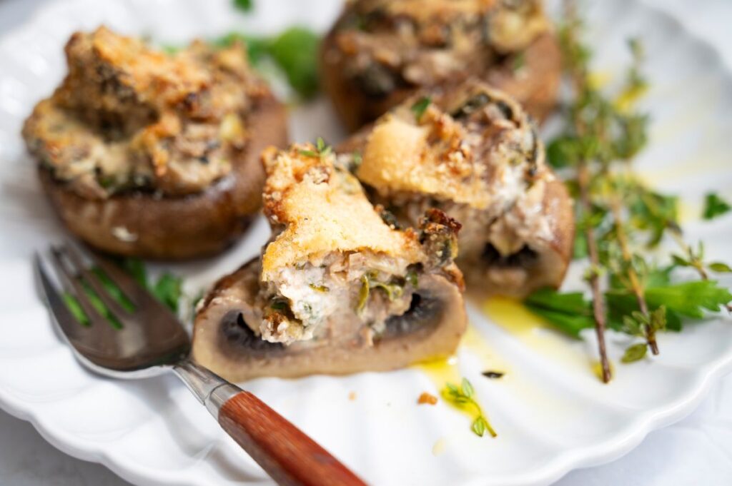 Stuffed Mushrooms on a white plate.