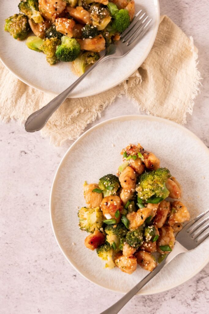 Honey Garlic Chicken with Broccoli on a white plate.