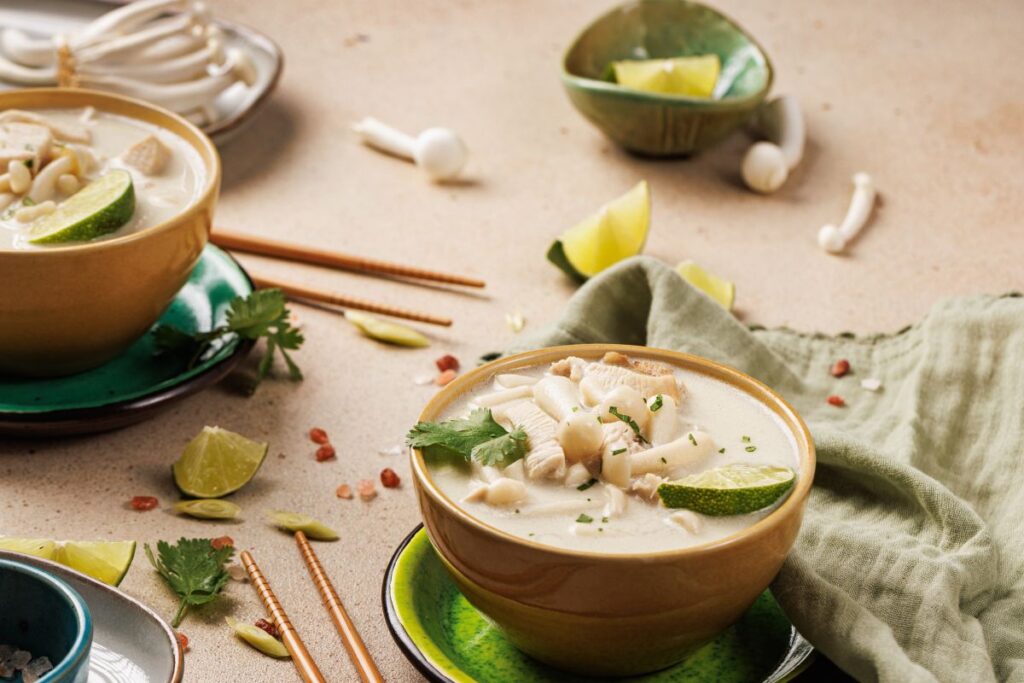 Diabetic-Friendly Thai Coconut Chicken Soup in a bowl with chopsticks. 