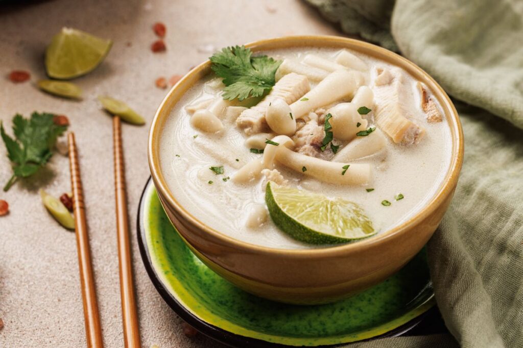 Diabetic-Friendly Thai Coconut Chicken Soup in a bowl with chopsticks.
