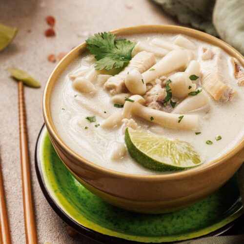 Diabetic-Friendly Thai Coconut Chicken Soup in a bowl with chopsticks.