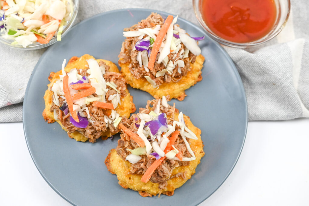 Keto pulled pork biscuit bites on a plate.