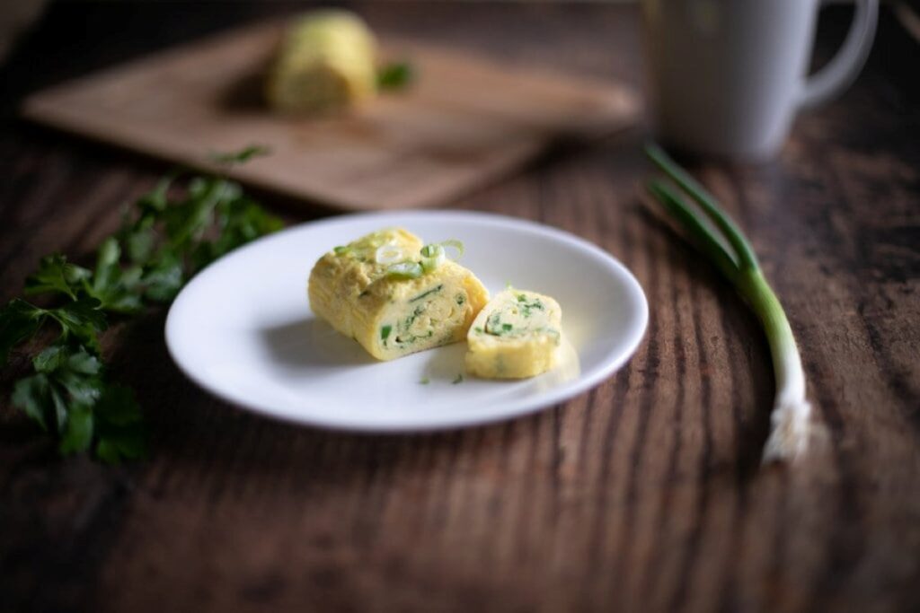 Breakfast Egg Rolls on a white plate.