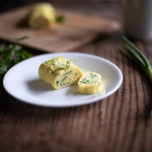 Breakfast Egg Rolls on a white plate.