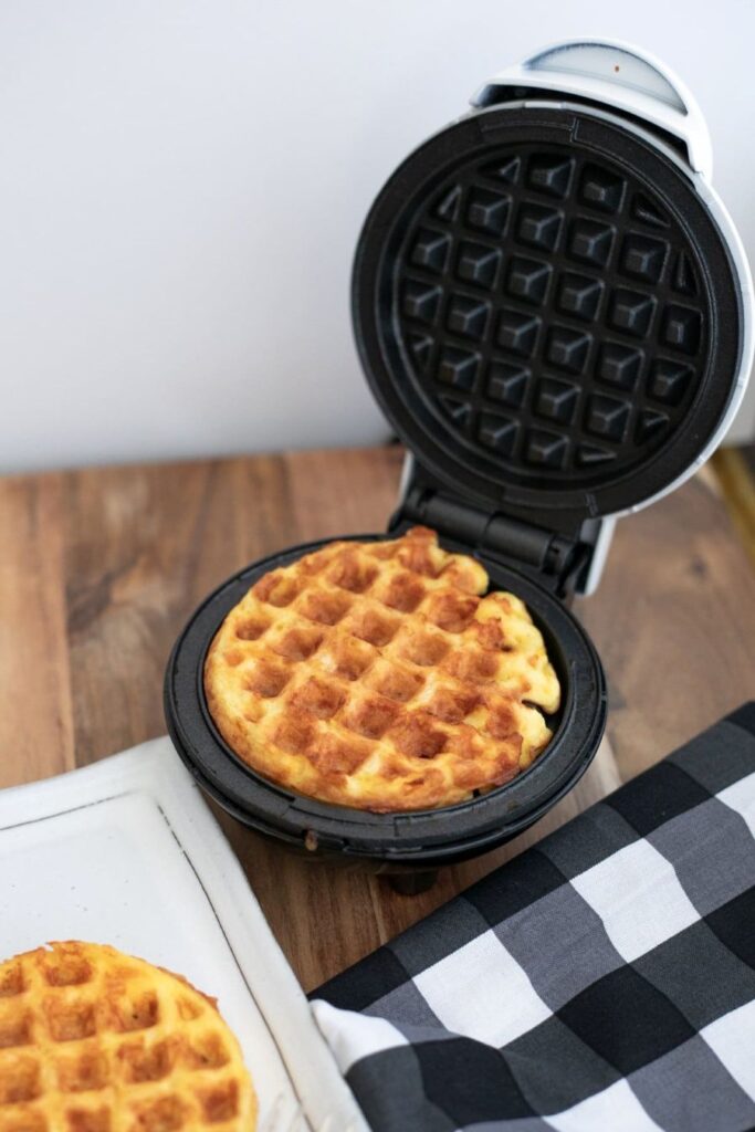 Keto Chaffle in a waffle iron.