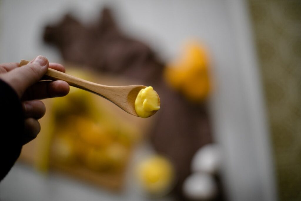 Lemon Curd on a spoon.