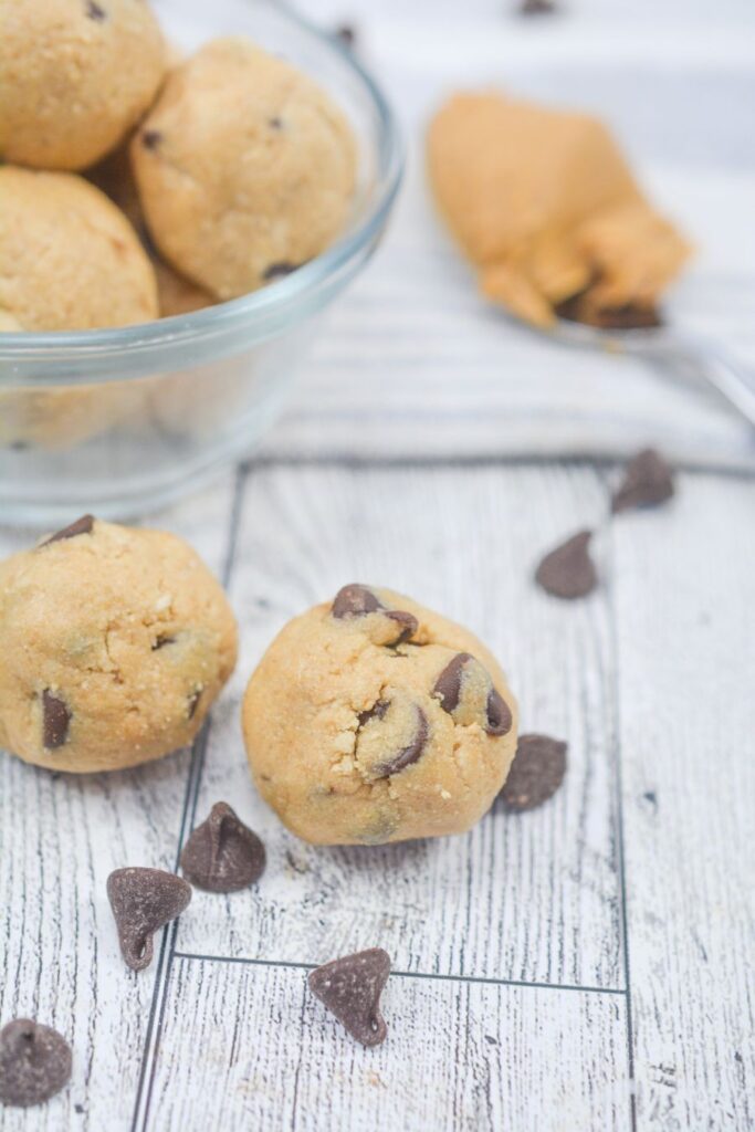 Cookie Dough Energy Balls on a board.
